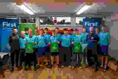 FAI’s Rob Hennessy presenting referee kits to Clontarf FC players